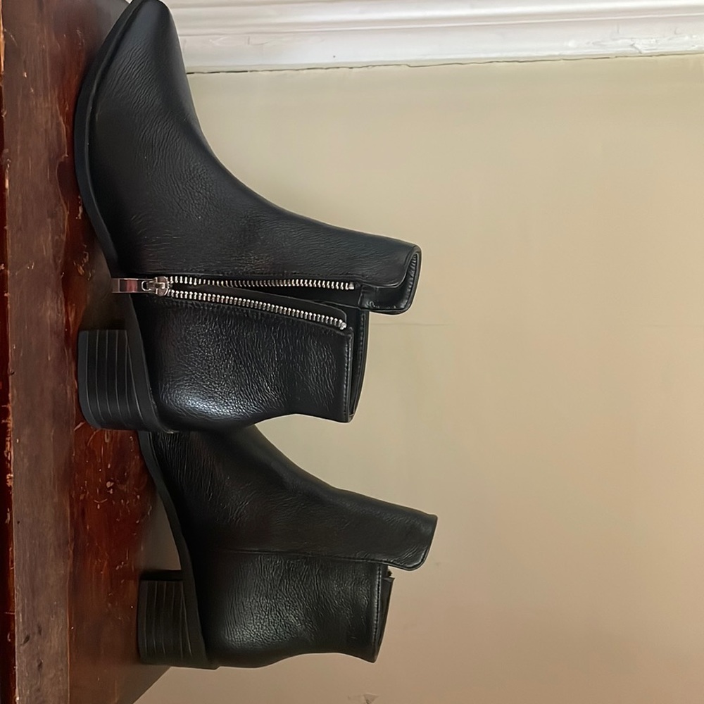Black boots with zipper on side never worn